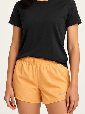 Women’s Nike Light Orange  with Nike Swoosh Logo Elastic Waistband Shorts, Med.